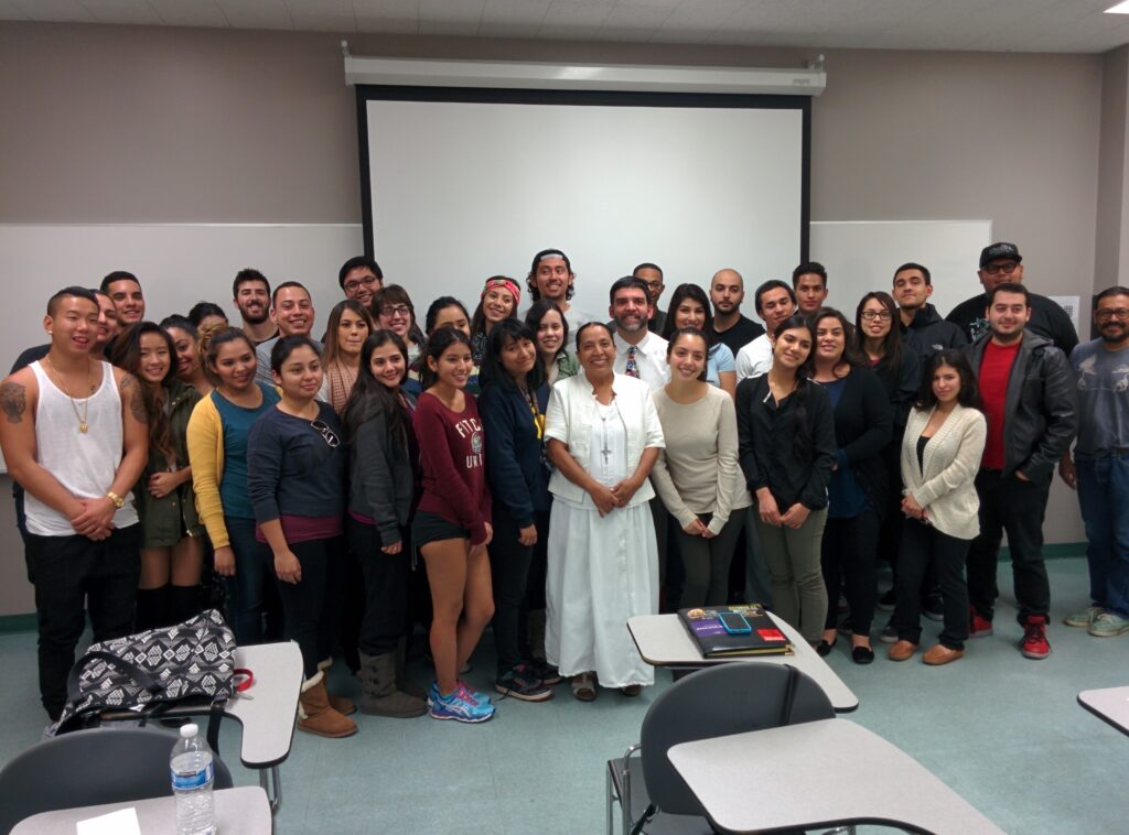 Olga Sanchez Martinez (center, wearing white) visited a class at California State University, Northridge in November 2015. Olga runs a shelter that helps migrants hurt by the "Death Train" in Chiapas, Mexico. More information about her shelter Albergue Jesus el Buen Pastor is available by visiting http://www.alberguebuenpastor.org.mx/