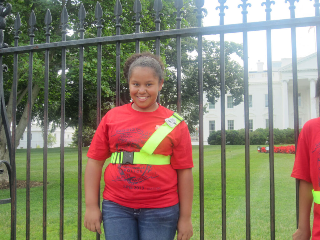 Jasmín stands in front of the White House in June, 2013. She was in Washington D.C. attending a conference for school safety volunteers.