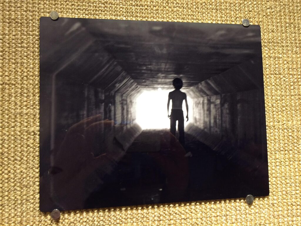 Photography work by Sam Houston State University student Autumn Dowdy. The piece intends to convey the emotional aspect of abandoned children searching for a future promise of belonging.